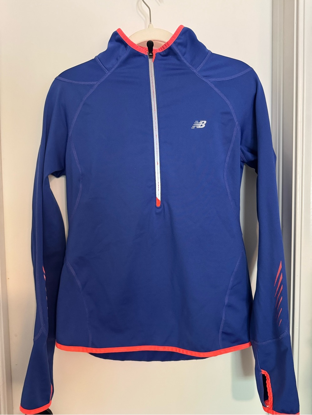 New Balance women’s Royal Blue Long-Sleeve Swim Rash Guard with Coral Trim